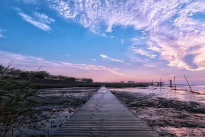 Scenic view of landscape against sky during sunset