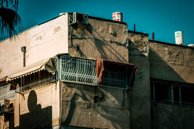 Low angle view of building against blue sky