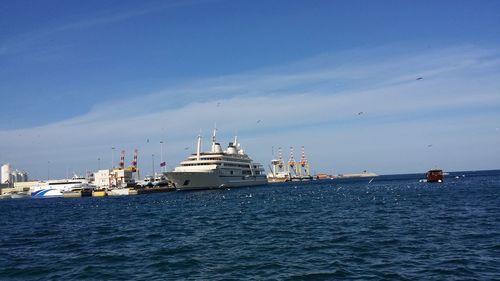 Boats moored at harbor