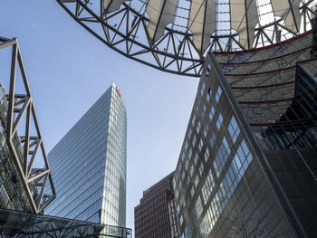 Low angle view of modern buildings against sky