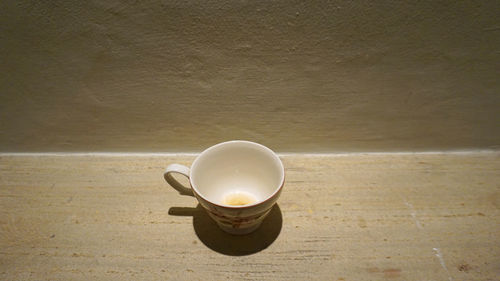 High angle view of coffee cup on table