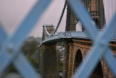 View of bridge against cloudy sky