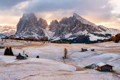 Scenic view of snowcapped mountains against sky