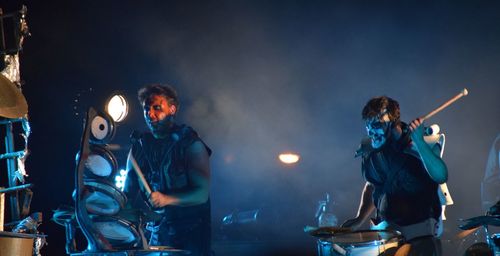 Group of people standing on stage