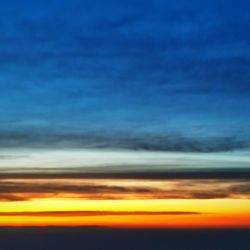 Scenic view of dramatic sky during sunset