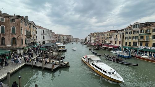 Boats moored at harbor