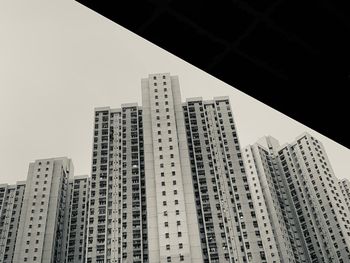 Low angle view of buildings against clear sky