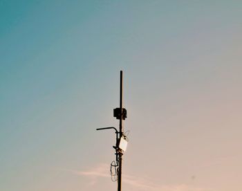 Low angle view of street light against sky