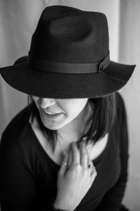 Portrait of woman wearing hat