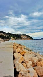 Scenic view of beach against sky