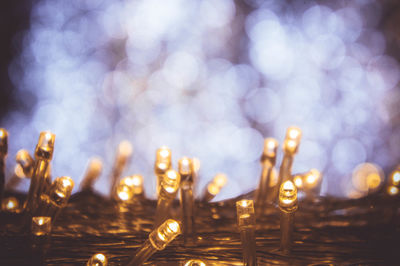 Close-up of lighting equipment at night