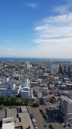 High angle view of buildings against sky