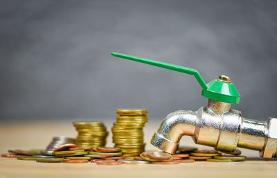 Close-up of coins on table