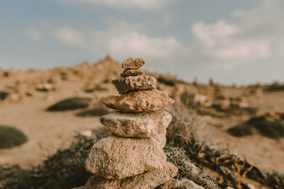 Close-up of stone stack on rock