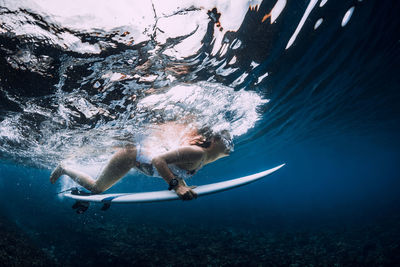 Man swimming in sea