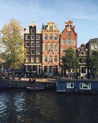 Buildings in city against sky