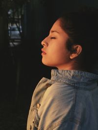 Portrait of teenage girl looking away