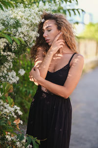 Beautiful young woman looking at camera