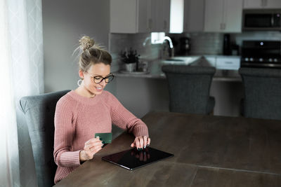 Young woman using mobile phone