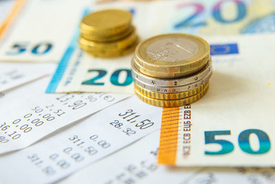 Close-up of coins on table