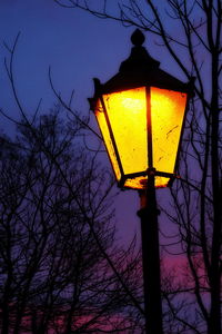 Low angle view of illuminated street light