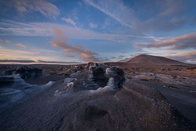 Scenic view of landscape against sky during sunset