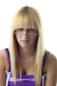 Portrait of a beautiful young woman against white background