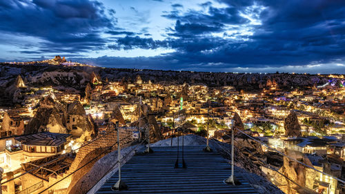 High angle view of illuminated buildings in town