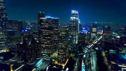 High angle view of illuminated buildings in city at night,iconic new york city skyline