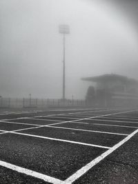 Empty road in foggy weather