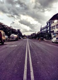 Cars on road against sky