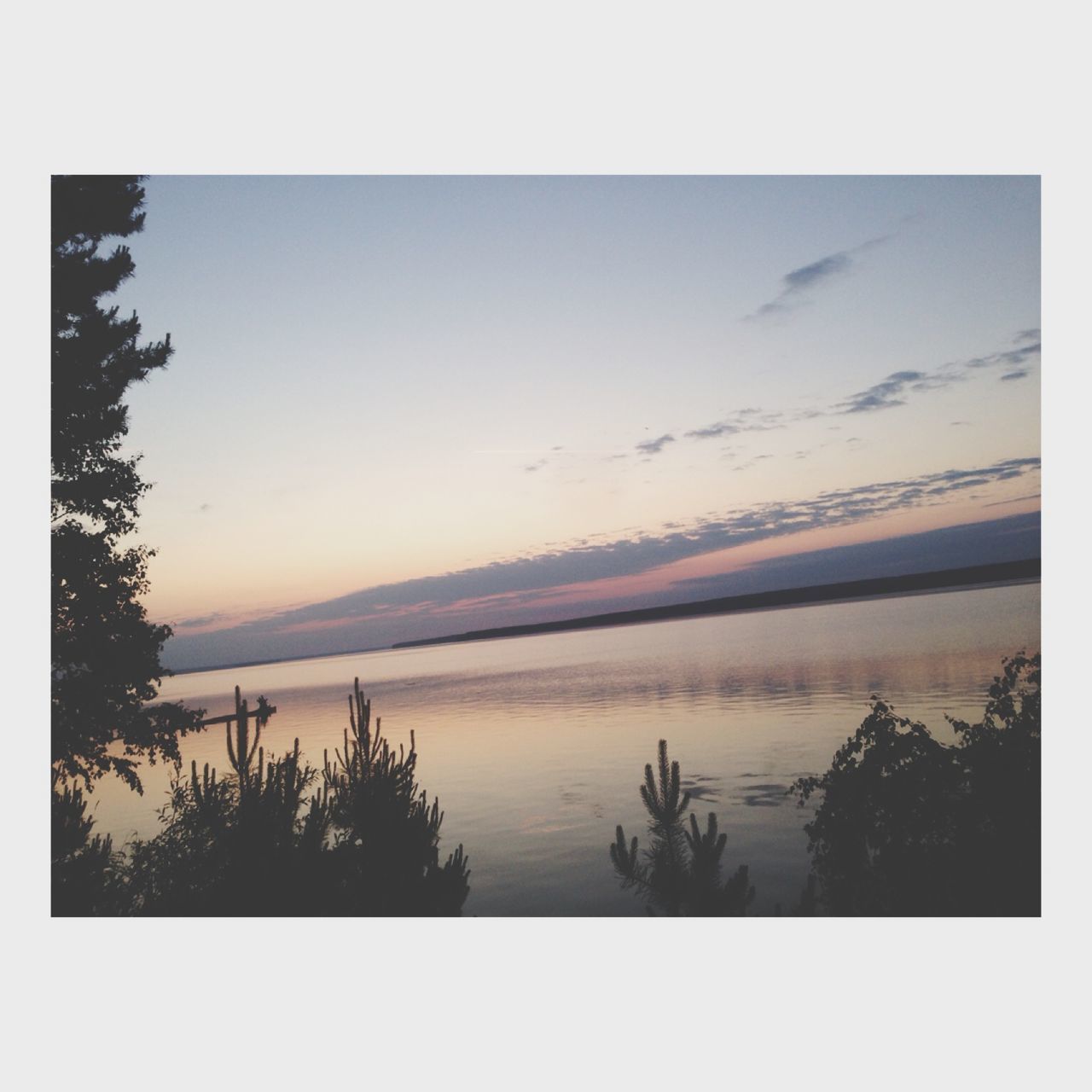 tranquil scene, transfer print, scenics, tranquility, water, beauty in nature, sky, sunset, auto post production filter, lake, nature, silhouette, idyllic, reflection, cloud - sky, cloud, outdoors, calm, dusk, no people