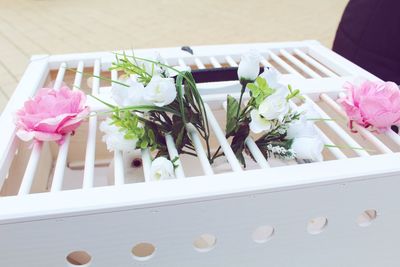 High angle view of pink flower on table