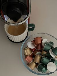 High angle view of coffee cups on table