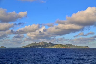 Scenic view of sea against blue sky