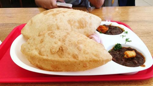 Close-up of bread in plate on table