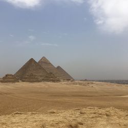 Scenic view of pyramid against sky