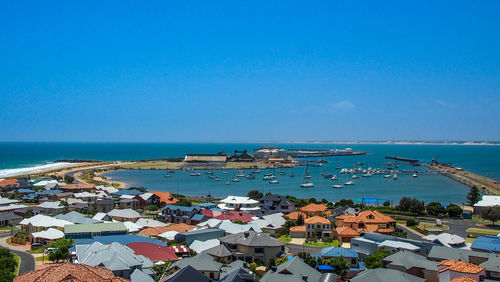 Scenic view of sea against clear blue sky