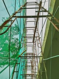 Low angle view of metallic structure against sky