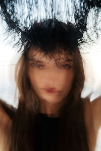 Blurred portrait of a young woman