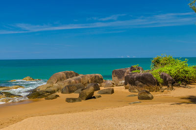 Scenic view of sea against blue sky