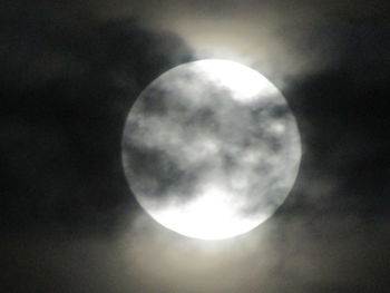 Low angle view of moon against sky at night