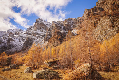 Panoramic view of rocky mountains against sky