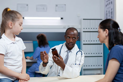 Female doctor examining patient