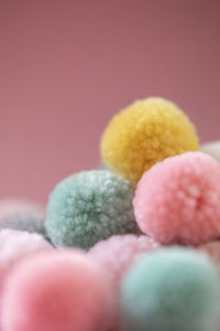 Close-up of multi colored balls on table