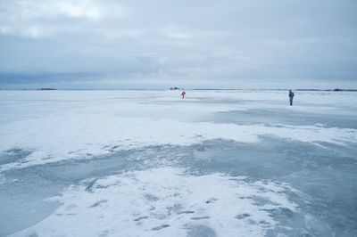 Scenic view of frozen sea against sky