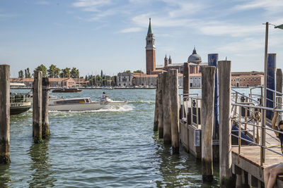 Canal passing through city buildings