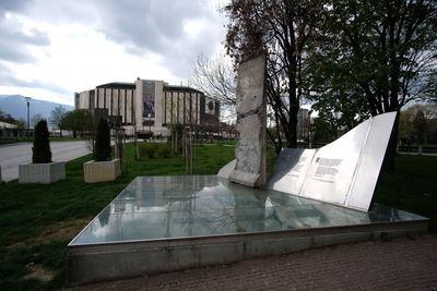 View of swimming pool in park against sky