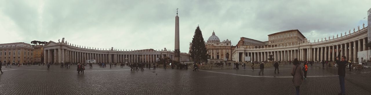 architecture, built structure, building exterior, famous place, large group of people, sky, travel destinations, tourism, international landmark, travel, history, place of worship, cloud - sky, tourist, religion, capital cities, person, spirituality, facade