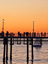 Lovely sunset and shades on the beach pier